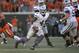 STILLWATER, OK - OCTOBER 5: Quarterback Daniel Sams #4 of the Kansas State Wildcats scrambles against the Oklahoma State Cowboys October 5, 2013 at Boone Pickens Stadium in Stillwater, Oklahoma. The Cowboys defeated the Wildcats 33-29. (Photo by Brett Deering/Getty Images)