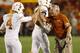 AMES, IA - OCTOBER 3: Head coach Mack Brown of the Texas Longhorns celebrates with kicker Anthony Fera #4 after an extra point in the second half of play against the Iowa State Cyclones at Jack Trice Stadium on October 3, 2013 in Ames, Iowa. Texas defeated Iowa State 31-30. (Photo by David Purdy/Getty Images)