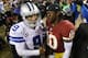 LANDOVER, MD - DECEMBER 30: Quarterbacks Tony Romo #9 of the Dallas Cowboys and Robert Griffin III #10 of the Washington Redskins talk following the Redskins 28-18 win at FedExField on December 30, 2012 in Landover, Maryland. (Photo by Rob Carr/Getty Images)