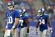 EAST RUTHERFORD, NJ - OCTOBER 06: Eli Manning #10 of the New York Giants walks off the field after throwing an interception in the fourth quarter against the Philadelphia Eagles at MetLife Stadium on October 6, 2013 in East Rutherford, New Jersey.The Philadelphia Eagles defeated the New York Giants 36-21. (Photo by Elsa/Getty Images)