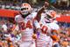 SYRACUSE, NY - OCTOBER 5: Zac Brooks #24 and Tajh Boyd #10 of Clemson Tigers jump to celebrate the team's second touchdown scored by Zac Brooks on a handoff in the first quarter against Syracuse Orange on October 5, 2013 at the Carrier Dome in Syracuse, New York. Clemson defeated Syracuse 49-14. (Photo by Brett Carlsen/Getty Images)