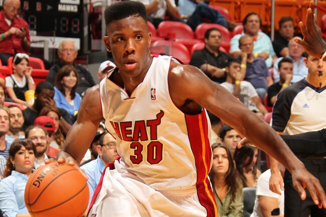 Hi-res-183600127-norris-cole-of-the-miami-heat-dribbles-to-the-rim_crop_north