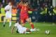 PODGORICA, MONTENEGRO - MARCH 26: Stevan Jovetic of Montenegro is tackled by Glen Johnson of England during the FIFA 2014 World Cup Qualifier Group H match between Montenegro and England at City Stadium on March 26, 2013 in Podgorica, Montenegro. (Photo by Michael Regan/Getty Images)