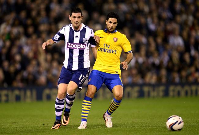 Hi-res-181801274-graham-dorrans-of-west-bromwich-albion-and-mikel-arteta_crop_north
