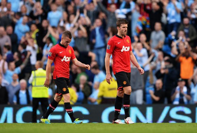 Hi-res-181548886-tom-cleverley-and-michael-carrick-of-manchester-united_crop_north