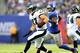 EAST RUTHERFORD, NJ - OCTOBER 06: Brent Celek #87 of the Philadelphia Eagles carries the ball as Antrel Rolle #26 of the New York Giants defends at MetLife Stadium on October 6, 2013 in East Rutherford, New Jersey.The Philadelphia Eagles defeated the New York Giants 36-21. (Photo by Elsa/Getty Images)