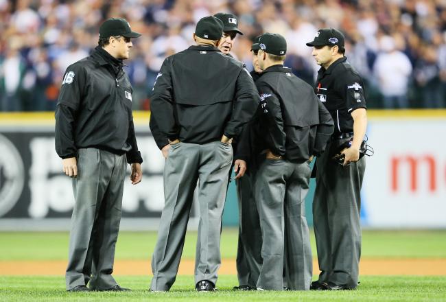 Hi-res-183662351-officials-review-a-seventh-inning-home-run-by-victor_crop_north