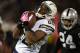 OAKLAND, CA - OCTOBER 06: Vincent Brown #86 of the San Diego Chargers catches a fifty one yard pass over Charles Woodson #24 of the Oakland Raiders during the third quarter at O.co Coliseum on October 6, 2013 in Oakland, California. The Raiders won the game 27-17. (Photo by Thearon W. Henderson/Getty Images)