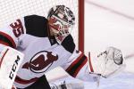 Hi-res-183676594-cory-schneider-of-the-new-jersey-devils-makes-a-save_crop_north