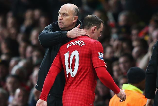 Hi-res-167214733-wayne-rooney-of-manchester-united-is-consoled-by-mike_crop_north