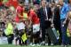 MANCHESTER, ENGLAND - SEPTEMBER 14: David Moyes manager of Manchester United shakes hands with Robin van Persie as he is replaced by Javier Hernandez of Manchester United during the Barclays Premier League match between Manchester United and Crystal Palace at Old Trafford on September 14, 2013 in Manchester, England. (Photo by Michael Regan/Getty Images)