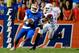GAINESVILLE, FL - OCTOBER 05: Tyler Murphy #3 of the Florida Gators scrambles for yardaage during the game against the Arkansas Razorbacks at Ben Hill Griffin Stadium on October 5, 2013 in Gainesville, Florida. (Photo by Sam Greenwood/Getty Images)