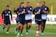 BURTON-UPON-TRENT, ENGLAND - AUGUST 12: Wayne Rooney, Steven Gerrard and Rickie Lambert of England warm up during a training session at St Georges Park on August 12, 2013 in Burton-upon-Trent, England. (Photo by Alex Livesey/Getty Images)