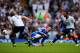 LONDON, ENGLAND - SEPTEMBER 28: Fernando Torres of Chelsea is challenged by Jan Vertonghen of Tottenham Hotspur as Mousa Dembele of Tottenham Hotspur (R) looks on during the Barclays Premier League match between Tottenham Hotspur and Chelsea at White Hart Lane on September 28, 2013 in London, England. (Photo by Clive Rose/Getty Images)