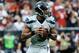 HOUSTON, TX - SEPTEMBER 29: Russell Wilson #3 of the Seattle Seahawks looks to pass against the Houston Texans at Reliant Stadium on September 29, 2013 in Houston, Texas. (Photo by Scott Halleran/Getty Images)