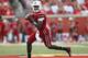 LOUISVILLE, KY - SEPTEMBER 21: Teddy Bridgewater #5 of the Louisville Cardinals looks to throws a pass during the game against Florida International Panthers at Papa John's Cardinal Stadium on September 21, 2013 in Louisville, Kentucky. (Photo by John Sommers II/Getty Images)