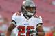 TAMPA, FL - AUGUST 29: Running back Doug Martin #22 of the Tampa Bay Buccaneers warms up for play against the Washington Redskins August 29, 2013 at Raymond James Stadium in Tampa, Florida. (Photo by Al Messerschmidt/Getty Images)