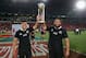 JOHANNESBURG, SOUTH AFRICA - OCTOBER 05: Charlies Piutau (L) and Charles Faumuina of the All Blacks hold the trophy after winning the Rugby Championship after their victory during the Rugby Championship match between South Africa Springboks and the New Zealand All Blacks at Ellis Park on October 5, 2013 in Johannesburg, South Africa. (Photo by David Rogers/Getty Images)