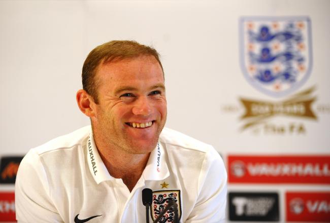 Hi-res-183697718-wayne-rooney-of-england-speaks-to-the-media-during-a_crop_north