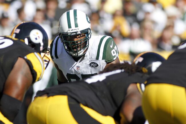 Hi-res-152839674-calvin-pace-of-the-new-york-jets-looks-on-against-the_crop_north