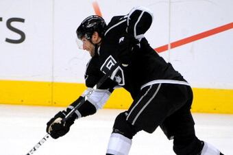 183707988-jarret-stoll-of-the-los-angeles-kings-shoots-the-puck_crop_north