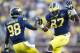 Oct 5, 2013; Ann Arbor, MI, USA; Michigan Wolverines tight end Devin Funchess (87) celebrates his forty six yard reception with quarterback Devin Gardner (98) in the fourth quarter against the Minnesota Golden Gophers at Michigan Stadium. Michigan won 42-13. Mandatory Credit: Rick Osentoski-USA TODAY Sports