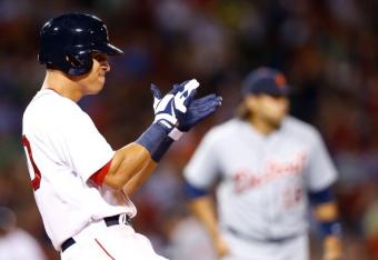 179516185-quintin-berry-of-the-boston-red-sox-celebrates-at-first_crop_north