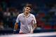 SHANGHAI, CHINA - OCTOBER 10: Roger Federer of Switzerland reacts after losing the game against Gael Monfils of France during day four of the Shanghai Rolex Masters at the Qi Zhong Tennis Center on October 10, 2013 in Shanghai, China. (Photo by Lintao Zhang/Getty Images)