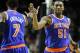 Oct 9, 2013; Providence, RI, USA; New York Knicks small forward Carmelo Anthony (7) and small forward Metta World Peace (51) celebrate during the first half of a game against the Boston Celtics at Dunkin Donuts Center. Mandatory Credit: Mark L. Baer-USA TODAY Sports