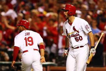183790646-adam-wainwright-congratulates-jon-jay-as-he-scores-on-a_crop_north