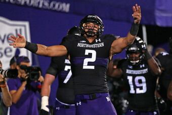 183715230-kain-colter-of-the-northwestern-wildcats-celebrates-a_crop_north