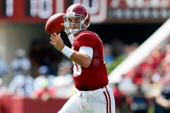 183167180-mccarron-of-the-alabama-crimson-tide-rolls-out-to-pass_crop_north