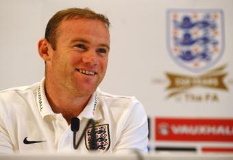 183697705-wayne-rooney-of-england-speaks-to-the-media-during-a_crop_north