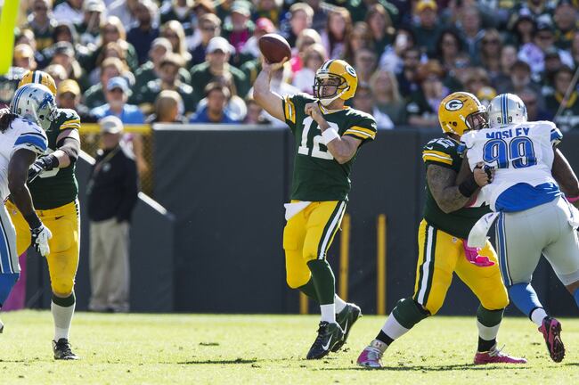 Hi-res-183452935-aaron-rodgers-of-the-green-bay-packers-passes-the-ball_crop_north