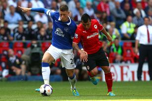 Hi-res-178925689-ross-barkley-of-everton-controls-the-ball-from-gary_crop_north