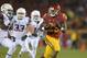 Oct 10, 2013; Los Angeles, CA, USA; Southern California Trojans tailback Tre Madden (23) is pursued by Arizona Wildcats cornerback Jonathan McKnight (6) on a 62-yard touchdown reception in the first quarter at Los Angeles Memorial Coliseum. Mandatory Credit: Kirby Lee-USA TODAY Sports