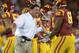 Oct 10, 2013; Los Angeles, CA, USA; Southern California Trojans interim coach Ed Orgeron congratulates left guard Jordan Simmons (68) after a touchdown in the first quarter against the Arizona Wildcats at Los Angeles Memorial Coliseum. Mandatory Credit: Kirby Lee-USA TODAY Sports