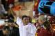 LOS ANGELES, CA - OCTOBER 10: Interim head coach Ed Orgeron of the USC Trojans raises his fist after getting a shower from his team at the end of the game with the Arizona Wildcats at Los Angeles Coliseum on October 10, 2013 in Los Angeles, California. USC won 38-31. (Photo by Stephen Dunn/Getty Images)