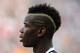 TURIN, ITALY - SEPTEMBER 22: Paul Pogba of Juventus looks on prior to the Serie A match between Juventus and Hellas Verona FC at Juventus Arena on September 22, 2013 in Turin, Italy. (Photo by Valerio Pennicino/Getty Images)