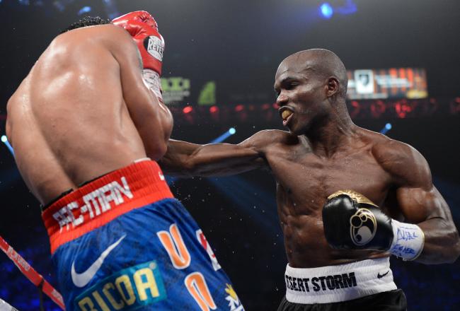 Hi-res-146092035-timothy-bradley-lands-a-right-to-the-head-of-manny_crop_north