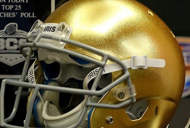Hi-res-159033993-the-coaches-trophy-sits-with-the-helmets-for-the-notre_crop_north