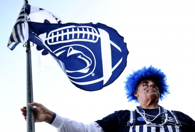Hi-res-132396212-fan-sets-up-his-penn-state-flag-before-the-penn-state_crop_north