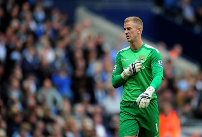 Hi-res-183153278-goalkeeper-joe-hart-of-manchester-city-looks-on-during_crop_north