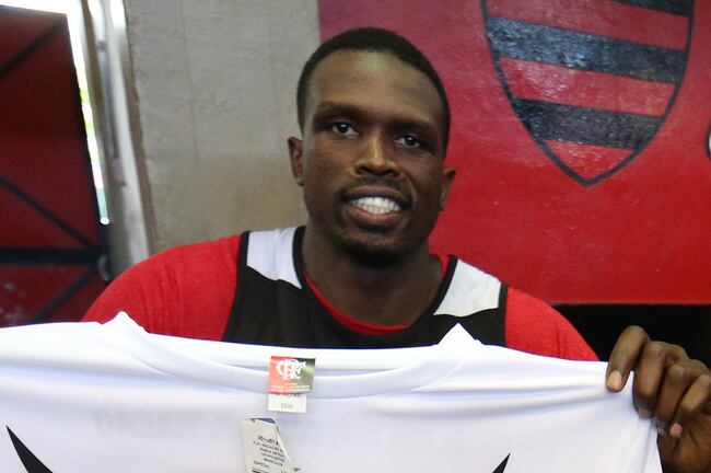 Hi-res-183738519-luol-deng-of-the-chicago-bulls-holds-a-shirt-during_crop_north
