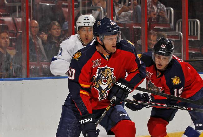 Hi-res-182240358-joey-crabb-of-the-florida-panthers-attempts-to-pass-the_crop_north