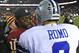 Dec 30, 2012; Landover, MD, USA; Washington Redskins quarterback Robert Griffin III (10) talks with Dallas Cowboys quarterback Tony Romo (9) after the game at FedEX Field. The Redskins won 28 - 18. Mandatory Credit: Brad Mills-USA Today Sports