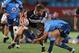 PRETORIA, SOUTH AFRICA - OCTOBER 04: Dale Chadwick of the Sharks is tackled by Handre Pollard of the Blue Bulls during the Absa Currie Cup match between Vodacom Blue Bulls and The Sharks at Loftus Versfeld on October 04, 2013 in Pretoria, South Africa. (Photo by Steve Haag/Gallo Images/Getty Images)