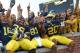 ANN ARBOR, MI - OCTOBER 05: Sione Houma #39 Csont's York #81 and Reon Dawson #20 of the Michigan Wolverines celebrate a win over the Minnesota Golden Gophers at Michigan Stadium on October 5, 2013 in Ann Arbor, Michigan. Michigan defeated Minnesota 42-13. (Photo by Leon Halip/Getty Images)