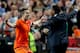 AMSTERDAM, NETHERLANDS - OCTOBER 11: Robin van Persie of Holland celebrates with Patrick Kluivert after scoring their fourth goal during the FIFA 2014 World Cup Qualifing match between Holland and Hungary at Amsterdam Arena on October 11, 2013 in Amsterdam, Netherlands. (Photo by Scott Heavey/Getty Images)