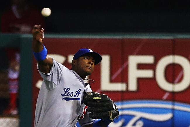 Hi-res-184185131-yasiel-puig-of-the-los-angeles-dodgers-turns-a-double_crop_north